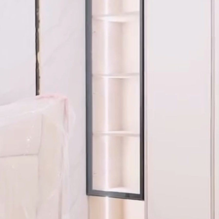 White gloss wardrobe with a backlit glass niche